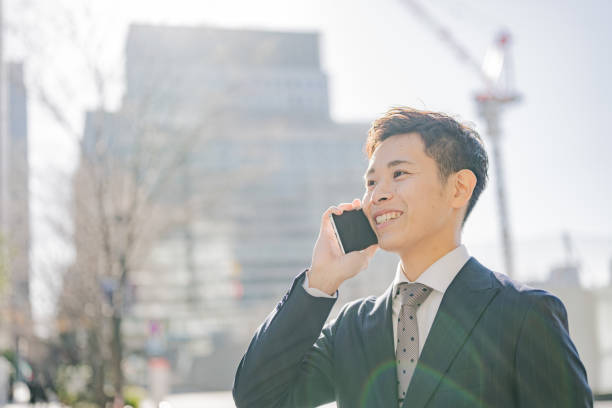 istock Urban tokyo and businessman with phone 2012142002