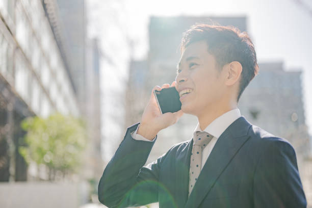 istock Urban tokyo and businessman with phone 2012142003