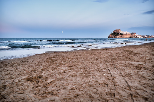 Beautiful panoramic view of the fortress of Peñiscola after a storm.