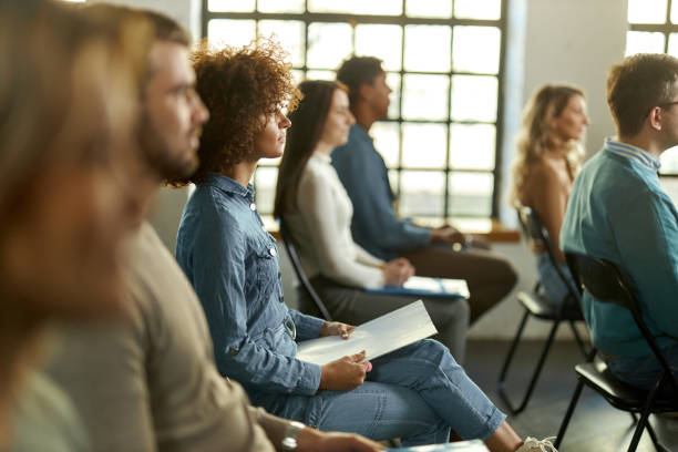 istock Young freelancers having a seminar in board room. 2012186100