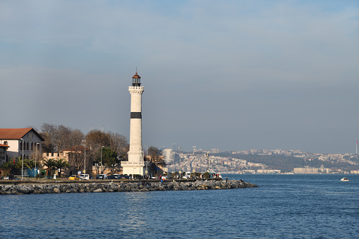 Istanbul, Turkey - December 10, 2023: Ahirkapi Feneri historical lighthouse, cityscape of Istanbul