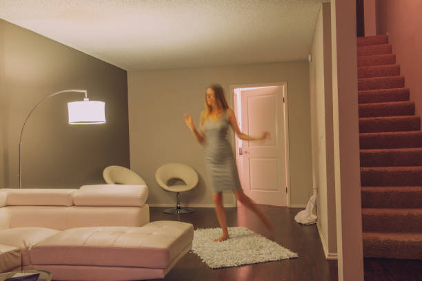 istock young beautiful woman in their home 2012238980