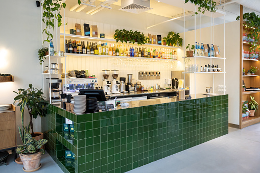 Empty coffee shop interior daytime with modern design counter