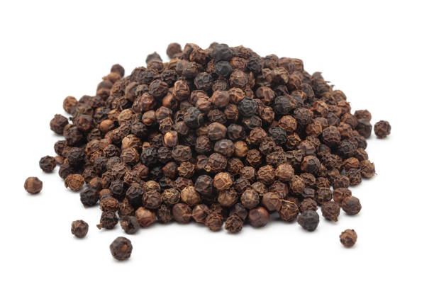 istock Close-up of Dry Organic Black pepper (Piper nigrum), isolated on a white background. Front view 2012251388