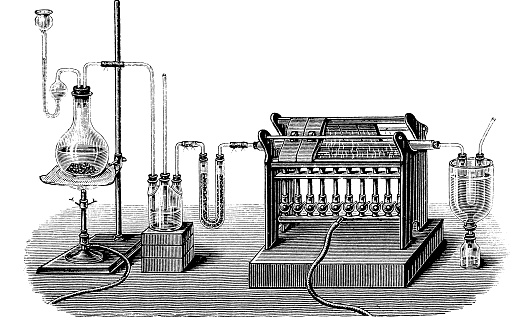 Lab equipment for production of  silicon tetrachloride : SiO2+Cl4+C2=SiCl4+2 CO. The silicon tetrachloride is condensed to colorless liquid form.