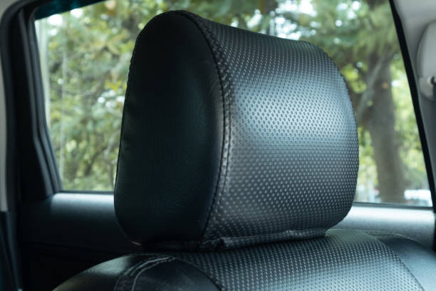 istock A black seat headrest in the car. Car leather headrest. 2012347075