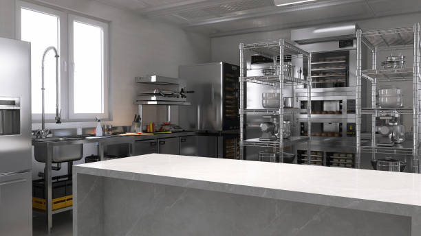 istock Empty clean white marble top island table in commercial, professional bakery kitchen with stainless steel convection, deck oven, freezer, refrigerator, shelf, cabinet, bread, bun 2012372135