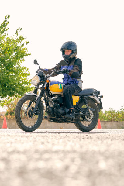 istock Biker riding motorcycle on asphalt road on motordrome 2012374795
