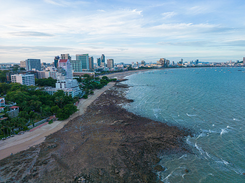 Aerial view Pattaya city building sea beach with boat morning sunrise travel city sightseeing in Thailand