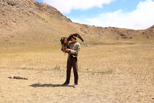 August 27 2023 - Bokonbayevo, Issyk Kul Province in Kyrgyzstan: Kyrgyz Eagle Hunters demonstrate a eagle hunt