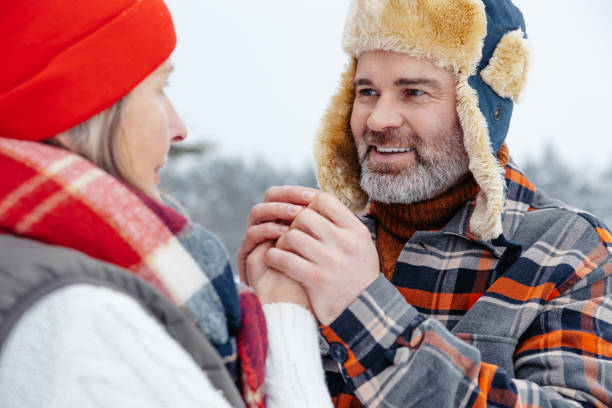 istock Happy mature couple spending time outdoors and looking in love 2012386543