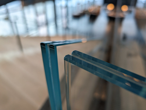 Glass on small clear plastic table
