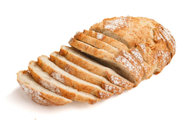 Sliced loaf of baked bread - foto de acervo
