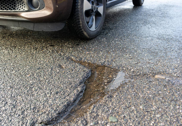 istock Pothole after frost on the road 2012453871