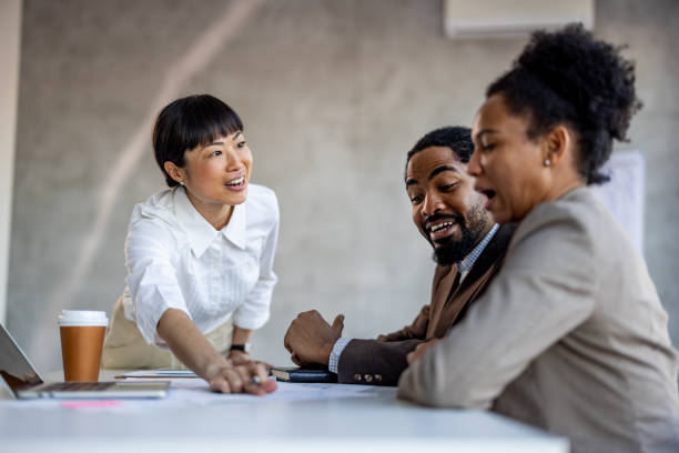 istock Shot of young creatives having a discussion in a modern office 2012457572