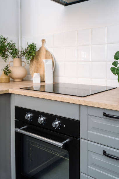 istock Electric oven and induction glass ceramic stove at modern kitchen 2012461309