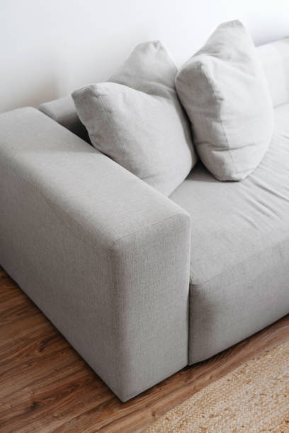 istock Modular couch with white upholstery in cozy living room 2012461835