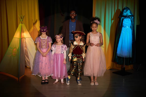 istock Kids Standing on Stage in Theater 2012470293