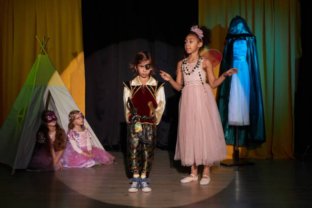 istock Boy and Girl Acting on Stage in School Play 2012470306