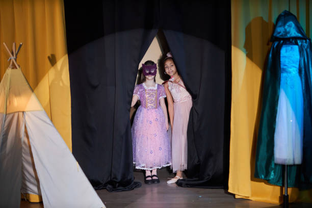 istock Two Girls Entering Stage in Theater 2012470307