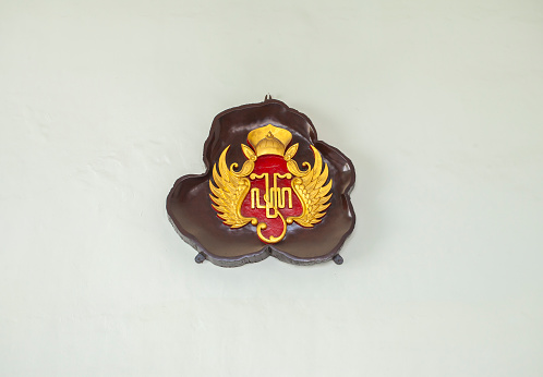 The symbol of the Sultanate of Jogjakarta, affixed to the wall of the palace. Jogja Palace is one of the favorite tourist destinations in Jogjakarta, Indonesia.