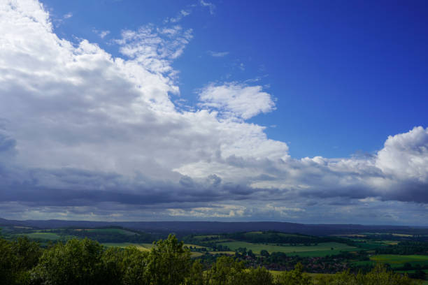 istock View of farm fields and clouds in the countryside 2012507838