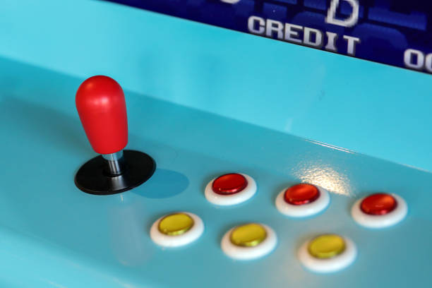 istock Retro Blue Arcade Machine, Joystick, Red And Yellow Buttons 2012513724