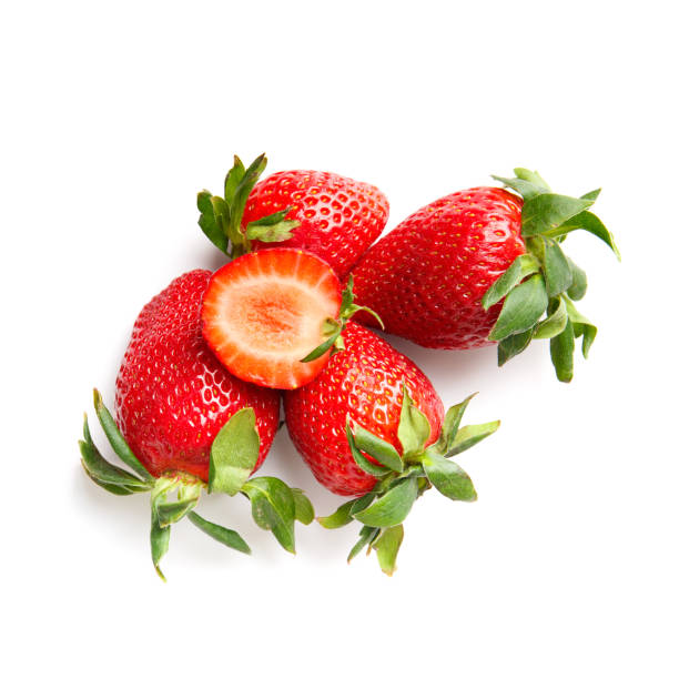 istock Strawberries and half a berry isolated on a white background top view. 2012532923