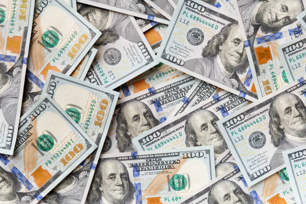 istock Background of 100 dollar bills 2012533434