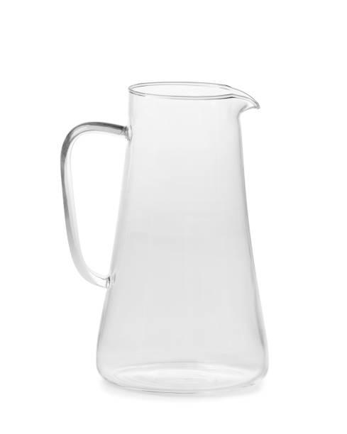 istock Empty glass jug for milk and drinks on a white background, isolated. 2012535051