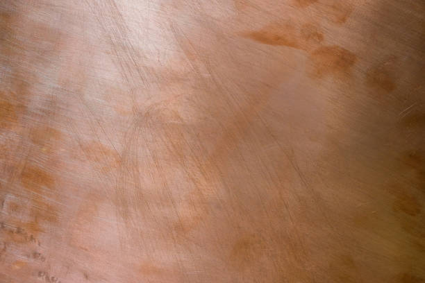 istock Copper background. Metal plate. Scratches. Lighting effect. 2012545647