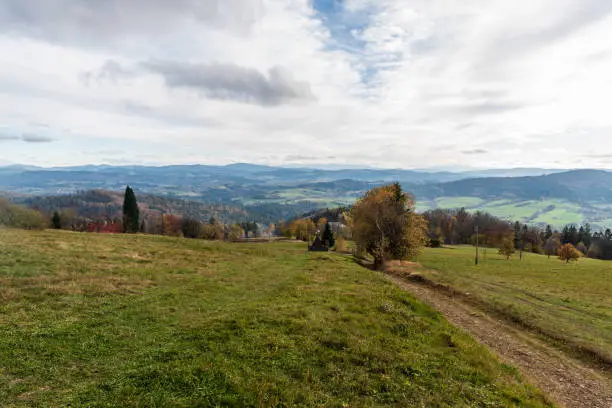 View from Bahenec in Slezske Beskydy mountains in Czech republic during autumn afternoon