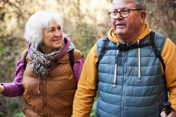 istock Wilderness Exploration: Positive Couple Explores Hiking Trail 2012561239