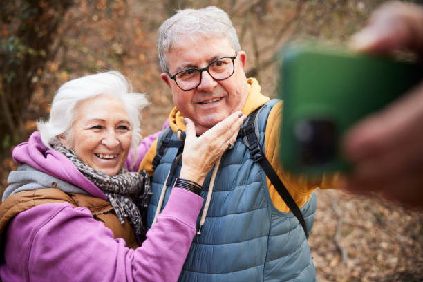 istock Outdoor Snapshot: Senior Couple Takes Selfie Together While Hiking 2012561862