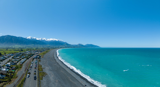 Discover the breathtaking coastline of Kaikoura, New Zealand, where stunning landscapes meet the majestic ocean, creating a captivating natural wonder.