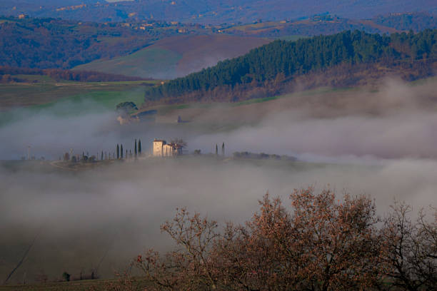 Watercolor effect of a panoramic view of idyllic landscape in the Soča Valley in Solkan during springtime, view of Italian hills in the background. Panoramic view of  vineyards ad lavander fields  near Solkan at sunset, Italian Collio and mount Sabotin in the background. Watercolor effect on a photography.