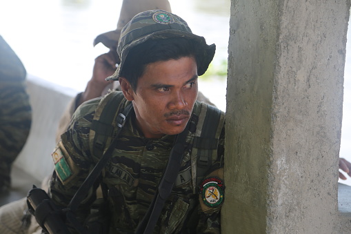 pau brasil, bahia / brazil - april 29, 2012: agents of the National Force are seen during patrol in a rural area of the city of Pau Brasil during conflict between indigenous and local farmers.