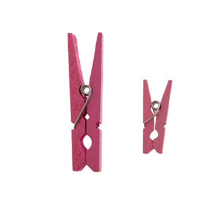 Clothes pegs isolated on white transparent, two sizes pink color clothepins,