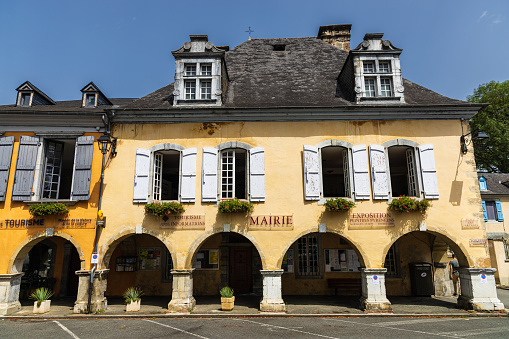 The Town Hall (Mairie), old traditional building with 17th century casement windows in the imposing slate attic. Saint-Pé-de-Bigorre, Hautes-Pyrénées, Occitania, France.