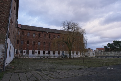 Cottbus, Germany - Jan 24, 2024: Royal Central Prison Cottbus was a prison used during five different periods. Imperial era, the Weimar Republic, the Nazi era, the GDR and until 2002. Selective focus