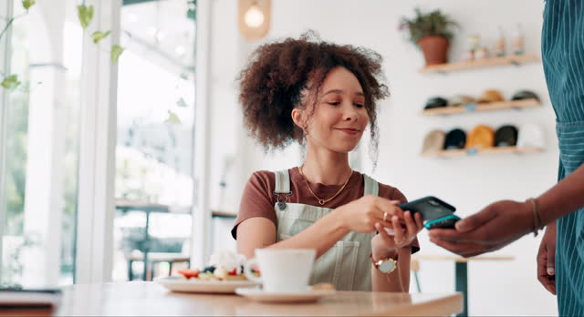 Customer service, cafe and phone payment for waffles, food and breakfast with POS machine and waiter hands. Young African woman with mobile tap or digital transaction at small business or coffee shop