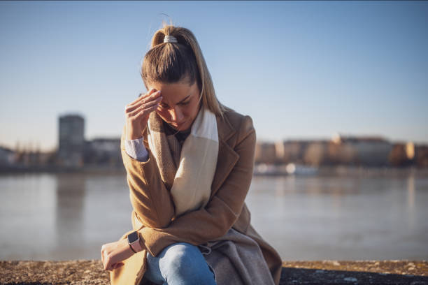 istock Worried woman having headache 2012726795