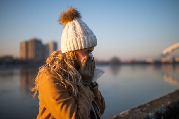 istock Woman blowing nose 2012733917