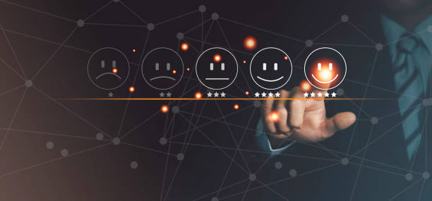 istock Businessman pressing smiley face emoticon on virtual touch screen Customer service appraisal concept satisfaction concept 2012795842
