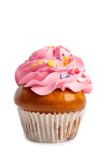 Cupcake with pink cremei in cocktail cherry isolated on white background.