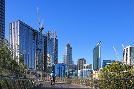 Buildings in the Perth CBD as seen from the Elizabeth Quay Bridge on a clear sky day