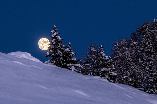 Val Tartano, full moon at Alpe Dassola in the evening