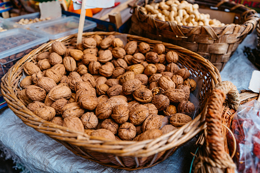 Walnuts in a basket for sale at a market in Catania, Sicily.