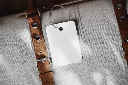 Blank luggage tag with cable loop mockup. 3D rendering