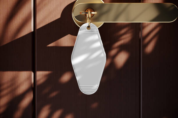 Plastic key chain with ring mockup. 3D rendering Blank plastic key chain with ring mockup. 3D rendering motel stock pictures, royalty-free photos & images